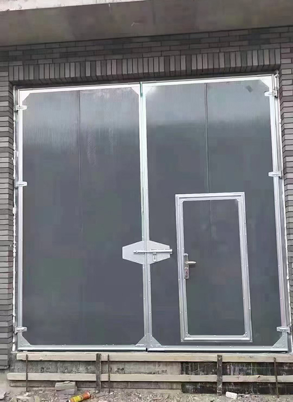 略阳工业平开门在大型设备制造车间的应用实例